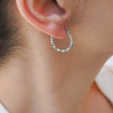 Silver hoop earrings wt engraved lines design