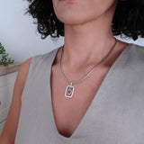 Silver-framed red enamel heart pendant necklace