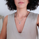 Silver-framed red enamel heart pendant necklace