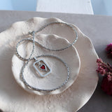 Silver-framed red enamel heart pendant necklace