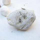 Silver Hoop Earrings with Geometric Charm