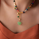 Shell Beaded Necklace with Green Heart Resin Pendant