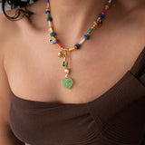 Shell Beaded Necklace with Green Heart Resin Pendant