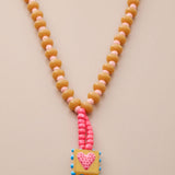 Κολιέ Με Καρδιά Και Πολύχρωμες Χάντρες