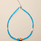 Blue Glass Beaded Fish Necklace With Orange Glass Fish Charm