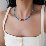 Blue Glass Beaded Fish Necklace With Red Glass Fish Charm