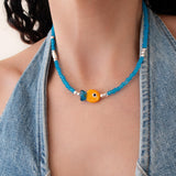 Blue Glass Beaded Fish Necklace With Orange Glass Fish Charm