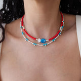 Red Glass Beaded Fish Necklace With Blue Glass Fish Charm