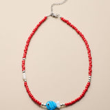 Red Glass Beaded Fish Necklace With Blue Glass Fish Charm