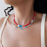 Red Glass Beaded Fish Necklace With Blue Glass Fish Charm