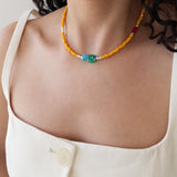 Orange Glass Beaded Fish Necklace With Green Glass Charm