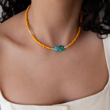 Orange Glass Beaded Fish Necklace With Green Glass Charm