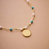 Gold Phaistos Disc Necklace, Pearl And Howlite Beaded Choker