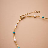Gold Phaistos Disc Necklace, Pearl And Howlite Beaded Choker