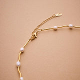 Gold Phaistos Disc Necklace, Pearl And Howlite Beaded Choker