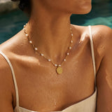 Gold Phaistos Disc Necklace, Pearl And Howlite Beaded Choker