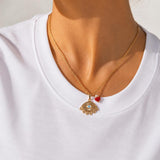 Gold Eye Necklace with Coral and Pearl